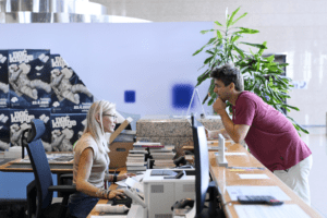 Member of the staff of NSK, the National and University Library in Zagreb, at one of the Library’s help desks dealing with a query from the Library’s user.