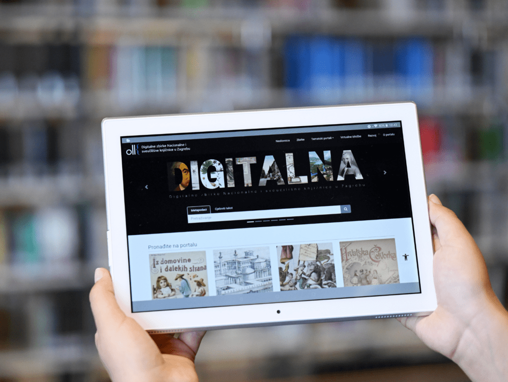 Two hands holding a tablet whose screen is showing the homepage of the digital collections website of NSK, the National and University Library in Zagreb.