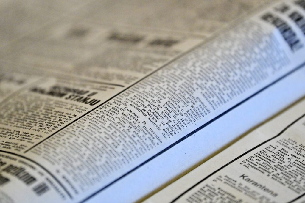 Inside of a newspaper title in the NSK collection.