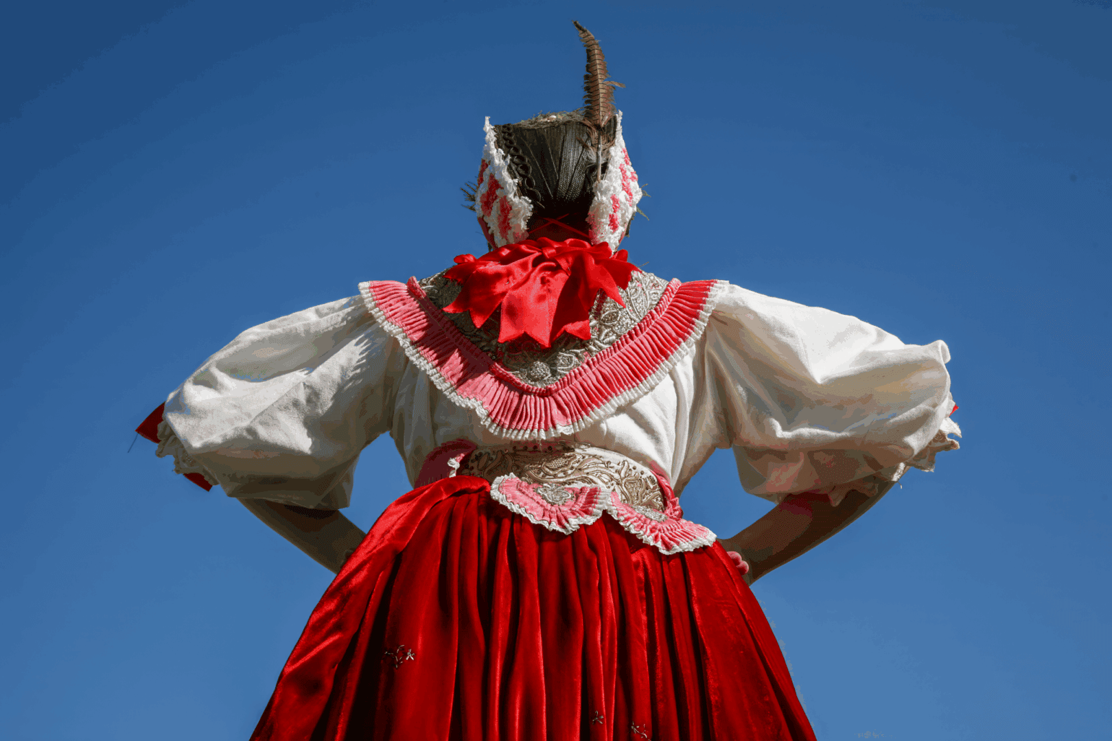 A photograph of a female person in a traditional Croatian costume by Vidoslav Vido Bagur.